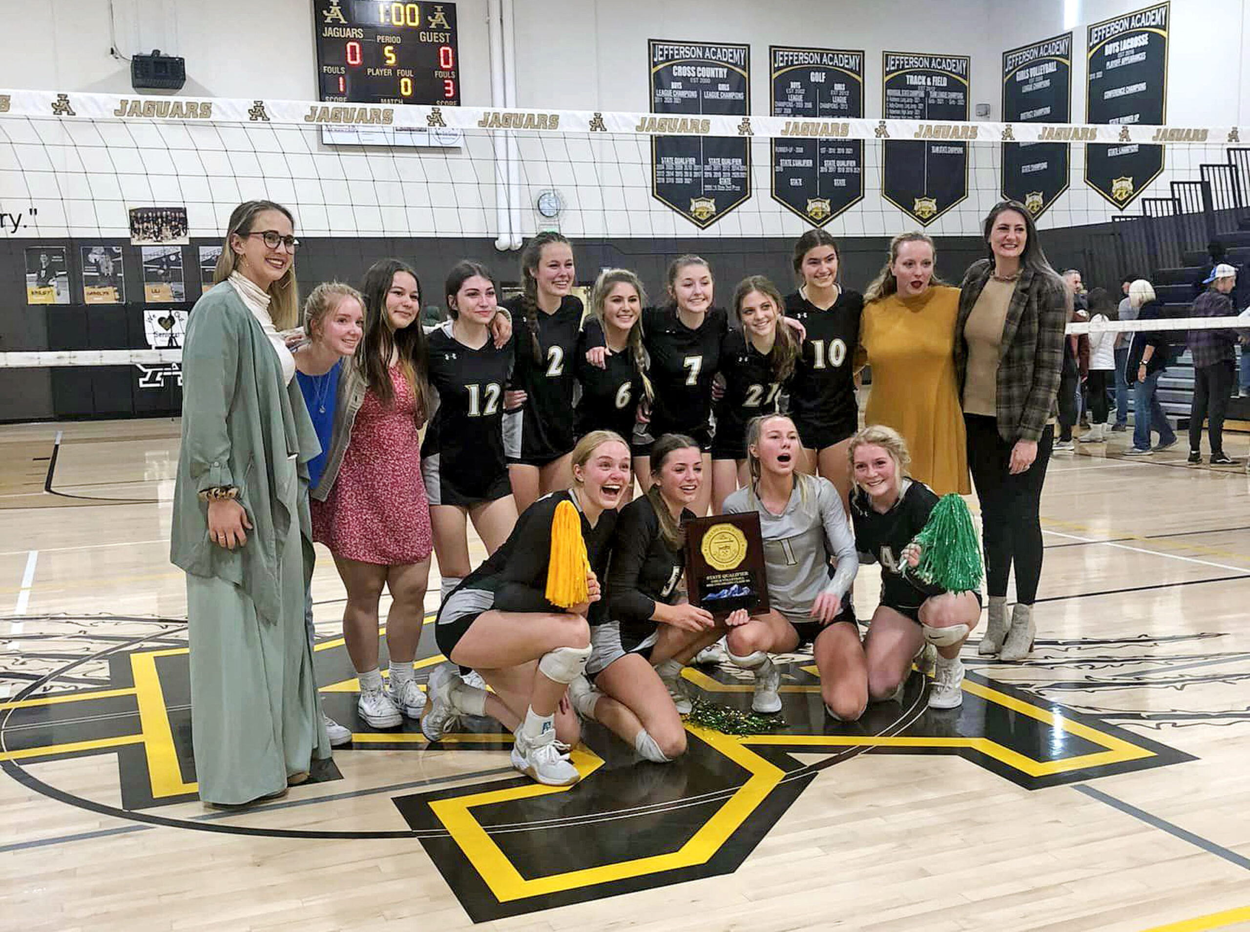 Courtesy of Manitou Springs School District 14. The Manitou Springs High School volleyball team celebrates heading to the 3A state tournament after defeating the Jefferson Academy Jaguars.
