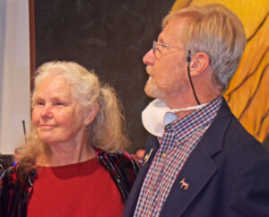 Photo by Rhonda Van Pelt. Lynn and Pete Lee listen to speeches during the gathering. Lynn Lee was lauded for her support of her husband’s career and her work in restorative justice.