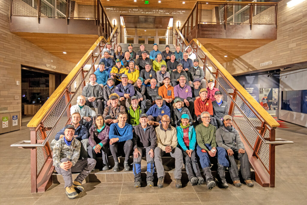 Photo by Mike Pach. AdAmAn members gather for a photo opp in the Pikes Peak Summit House.